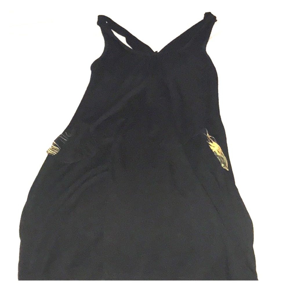 Sleeveless black dress.